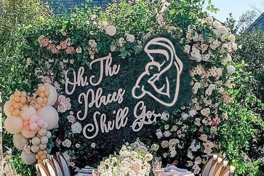 Mother holding baby, Baby shower decor