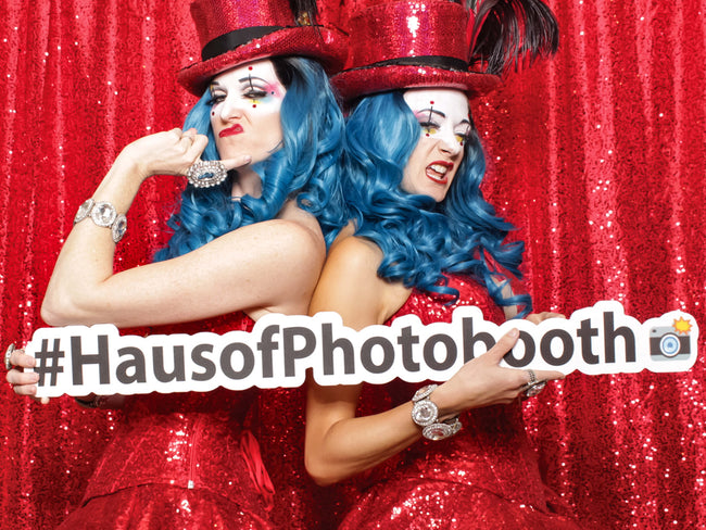 hashtag cutouts two models holding sign for photobooth