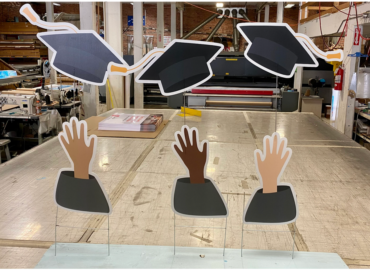 Graduation Yard Decor | Hands Throwing Hats at Graduation Celebration ...