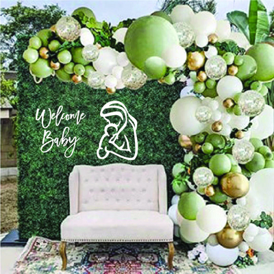 Mother holding baby, baby shower decor