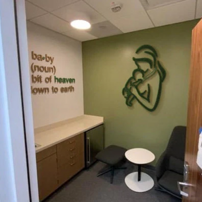Mother holding baby, Lactation room decor